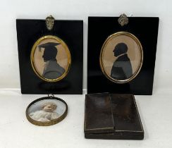 A 19th century silhouette, 10 x 8 cm, another, and four portrait miniatures frames