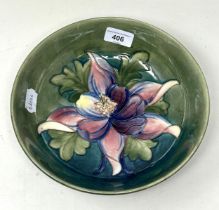 A Moorcroft pottery bowl, decorated flowers, 24 cm diameter