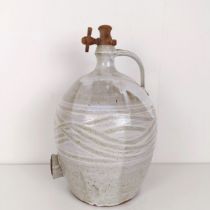 A white glazed cider jug, 40 cm high
