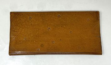 A Jonathan Garrett brown glazed plaque, with impressed and incised decoration, 32 x 15 cm
