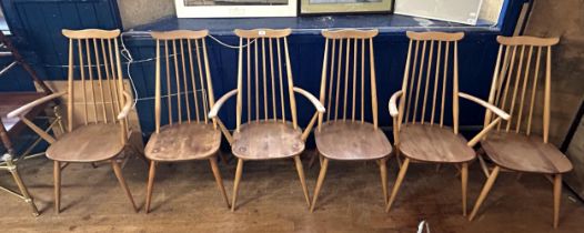 A set of six Ercol light elm dining chairs, with blue labels (4+2) One of the chairs has been broken