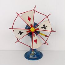 An unusual early 20th century table fan, painted with characters from Alice in Wonderland, 40 cm