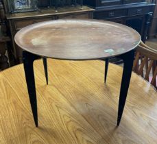 A Danish folding tray top table, stamped FH, 60 cm diameter paint, water damage & general wear to