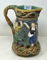 A Minton majolica style jug, decorated dancing figures, 24 cm high