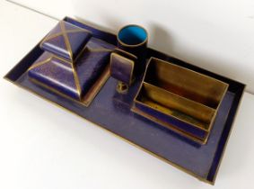 A 1920s cloisonné desk stand, with an inkwell, quill stand, letter stand and date holder, 39 cm wide