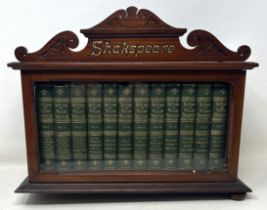The Works of William Shakspeare, 12 vols., in a mahogany and glazed case, 32 cm wide lacks two bun