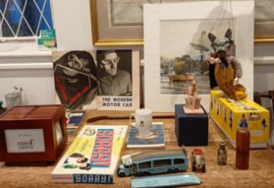 A Pelham puppet, Wolf, two vintage pop-up books, The Modern Aeroplane and The Modern Motorcar and