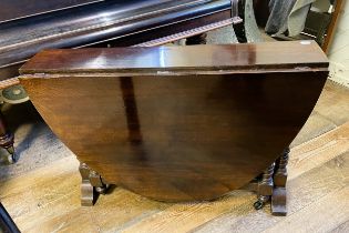 A mahogany Sutherland table, 110 cm wide, a painted bookcase, and four chairs (6)