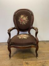 A late 19th/early 20th century mahogany armchair