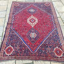 A Persian blue ground carpet, 282 x 204 cm Large hole to border, various wear, some losses, in