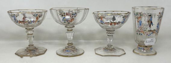 A pair of Continental glasses, decorated figures in enamel colours, and two other similar glasses (