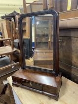 A mahogany bedroom mirror, the base with three drawers, 68 cm wide, and another, 40 cm wide (2)