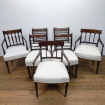 A set of four mahogany rail back dining chairs, and three armchairs (7)