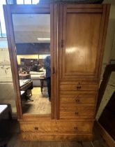 A walnut wardrobe, lacking cornice, 124 wide