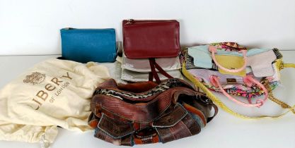 A Just Cavalli handbag, a Brics travel bag, another, a vanity case, a pair of child's curtains, a