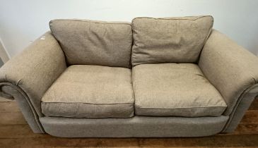 A grey upholstered sofa, 210 cm