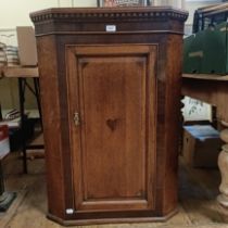 An oak corner cabinet, 70 cm wide, two bookcases, a pair of bedside chests, and assorted other