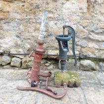 A water pump on a concrete base, and another similar (2)