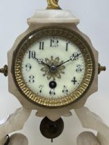 A mantel clock, with a single train movement, in an alabaster case, with gilt metal finial, 54 cm