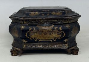 A 19th century lacquered tea caddy, with two canisters, 22 cm wide