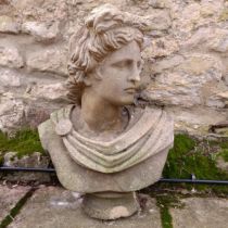 A composite stone garden bust of a man, 60 cm high