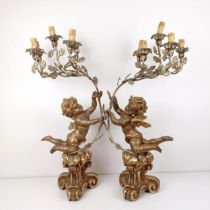 A pair of giltwood and metal lamps, in the form of cherubs, 80 cm high (2)