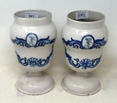 A pair of 19th century Continental Delft apothecary jars, 20 cm high