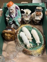 A 19th century novelty porcelain box, in the form of a man smoking, a sash window stop, and assorted