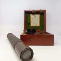 A 19th century brass adjustable telescope, 52 cm wide, and a Husun sextant, in a mahogany case (2)