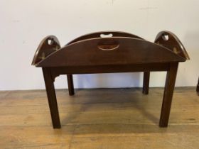 A butler's mahogany tray, on a stand, 82 cm wide