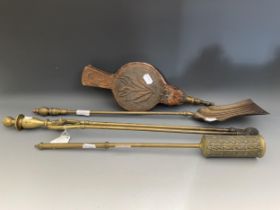 Three fire irons, and a pair of bellows (4)