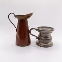 A pewter drinking vessel, with a brass and copper jug (2)