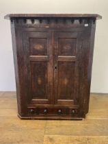 An oak corner cabinet, with three drawers to the base, 94 cm wide