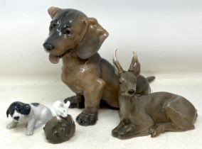 A Royal Copenhagen figure of a dog, another of a stag, a puppy, and a mouse (4) Tail off the