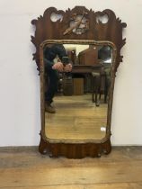 A mahogany fret framed mirror, 92 x 48 cm