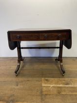 A 19th century mahogany sofa table, 87 cm wide