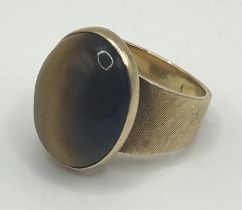 A 9ct gold and tigers eye ring, ring size H