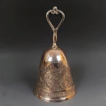 A Persian silver coloured metal table bell, 107 g, 13 cm high