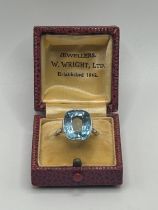 An 18ct white gold and aquamarine ring, ring size M, in a vintage jewellery box stone size: 14.3