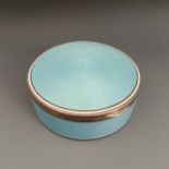 A Continental silver coloured metal and blue enamel circular box, all in 170 g