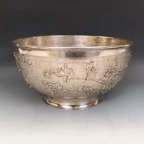 A Chinese silver coloured metal bowl, decorated blossom, stamped Luen Wo Shannhai, 790 g