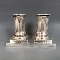 A pair of French silver squat candlesticks, 9 cm high, 304 g (2)