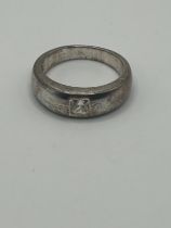 ***Withdrawn*** A silver coloured metal and diamond gypsy set ring, ring size L