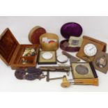 An oval leather jewellery box, various medallions, penknives, and assorted other items