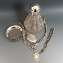 A Victorian silver vesta, a cut glass perfume bottle, with a silver mount, a Continental silver