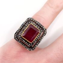 A large vintage style step-cut ruby and double diamond frame ring, in silver gilt, ruby 5.21ct,