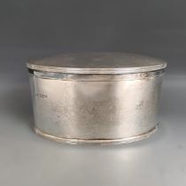 A George V silver oval caddy or biscuit box, Sheffield 1916, 20.5 ozt, 18 cm wide