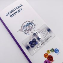 A certificated parcel of five security-sealed cabochon sapphire and glass composite gemstones, 25.