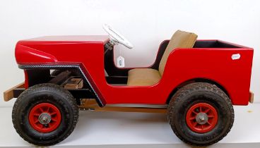 A pedal jeep, probably craft made