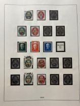 A group of assorted stamps, with some occasional and better ones throughout, in albums and loose